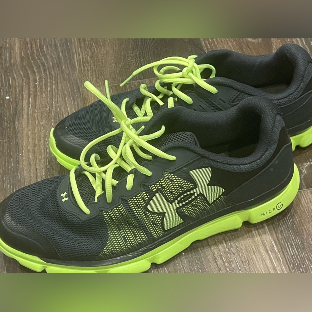 Under Armour Mens shoes size 12. Black and Neon Green. I will run fast